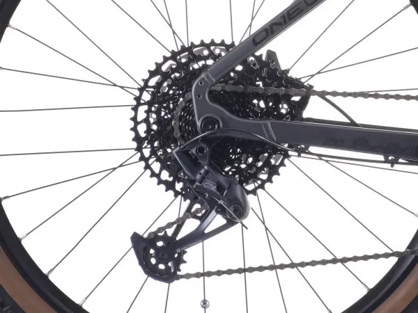 Crussis ONE-Guera 10.10 Women’s Mountain E-Bike Close-up of a bicycle gear system with 'ONEUP' branding on a white background.