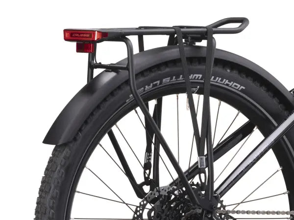 Close-up of The Crussis One-Country 7.10 - 522Wh wheel with a black fender and tire on a white background