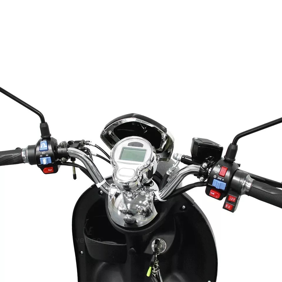Veleco ZT63 Retro Mobility Scooter 650W-Close-up of a motorcycle handlebar with control buttons and digital display on a white background