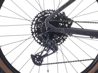 Crussis ONE-Guera 10.10 Women’s Mountain E-Bike Close-up of a bicycle gear system with 'ONEUP' branding on a white background.