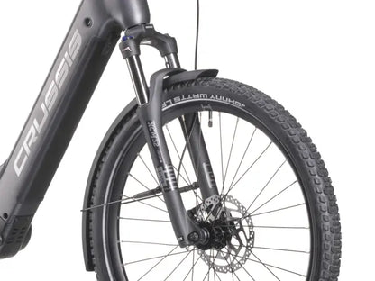 Close-up of aONE-Country 7.10 City E-Bike – Panasonic Motor, 522Wh Battery, 130km Range, Low Step Frame wheel with 'Cruze' branding.