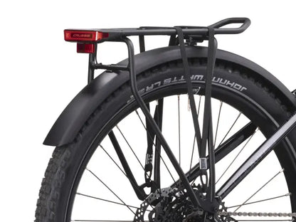 Close-up of The Crussis One-Country 7.10 - 522Wh  wheel with a black fender and tire on a white background 